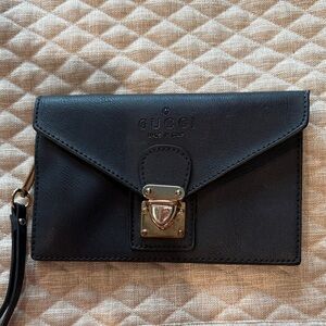 Vintage Gucci navy Leather with Embossed Logo